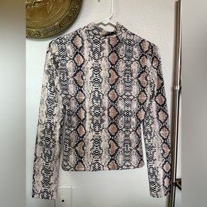 Snake patterned top
